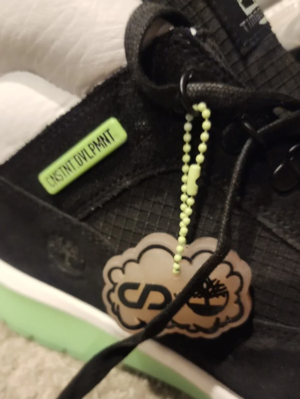 Black and White High-Top TIMBERLANS Sneakers with Mint Green  Glow Sole
